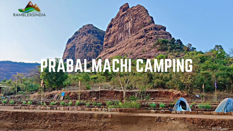 Prabalmachi campsite with mountain backdrop and tents.