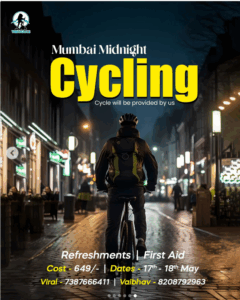 Cyclist on city street during nighttime event.