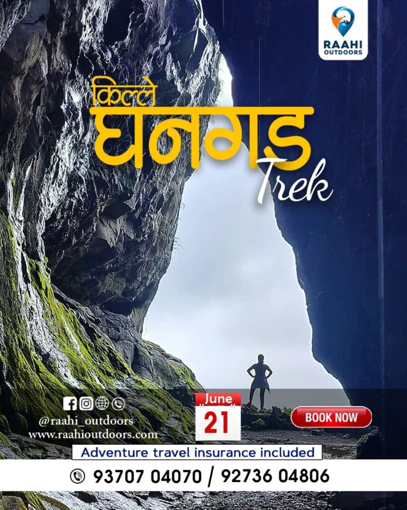 Person standing in rocky cave entrance, adventure trek.