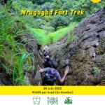 Hikers exploring Mrugagad Fort trek through rocky terrain.