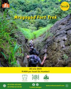 Hikers exploring Mrugagad Fort trek through rocky terrain.