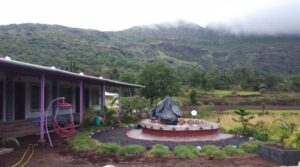 Mountain landscape with house and garden swing
