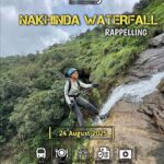 Person rappelling at Nakhinda Waterfall Adventure Event.