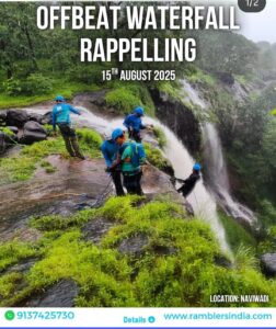 Group rappelling at waterfall, August 2025 event.