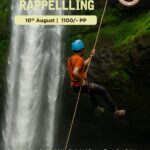 Person rappelling beside Diksal Waterfall