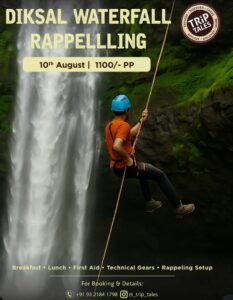 Person rappelling beside Diksal Waterfall