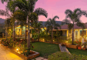 Scenic view of villa garden at sunset