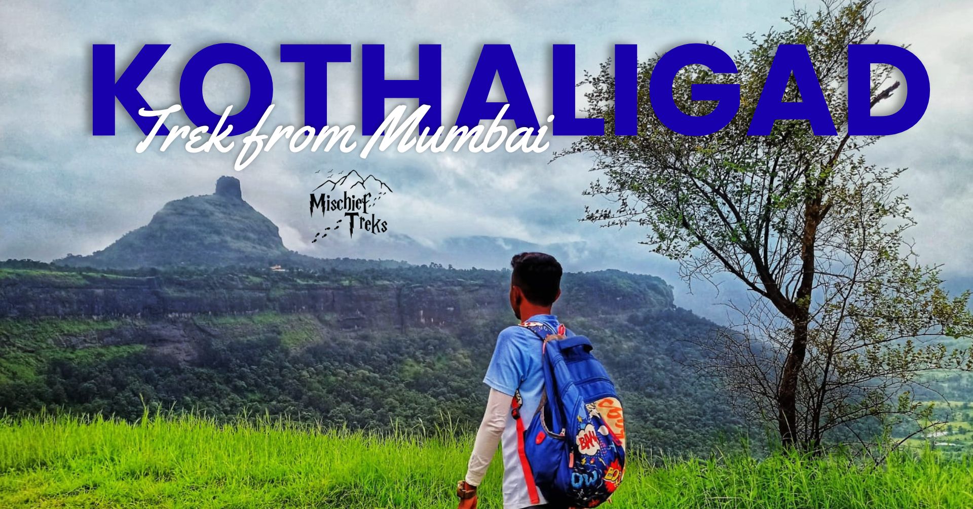 Kothaligad trekker overlooks scenic mountain view.