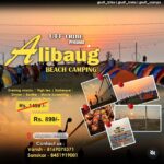 Alibaug beach camping event with tents and activities.